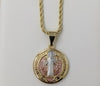 Gold plated Saint Benedict medal pendant on braided chain necklace.
Gold plated Saint Benedict medal pendant on rope cha