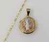Gold plated tri-color Saint Benedict medal pendant necklace on star chain.

Gold plated tri-color Saint Benedict medal p