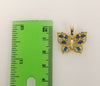 A delicate gold plated anchor pendant with intricate details.
A small gold plated flat anchor pendant for a nautical sty