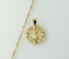 Gold plated Virgin Mary pendant on a 14K gold plated twist chain necklace.
Virgin Mary pendant hangs from a 14K gold pla