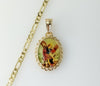 Gold plated figaro chain necklace with an archangel Saint Michael pendant.

Gold plated chain necklace with a Saint Mich