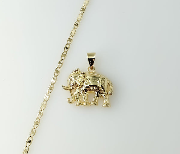 Gold plated Mariner anchor chain necklace with elephant pendant and chain detail.