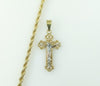 Gold plated tri-color cross pendant on a rope and braided chain necklace.