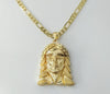 Gold plated 18K figaro chain necklace with Jesus pendant and clasp.