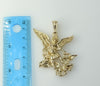 Large gold plated archangel pendant with intricate diamond cut details.
Gold plated figurine of Saint Michael with intri