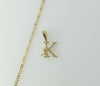 Delicate 2.5mm star chain necklace with gold plated letter "K" pendant.
