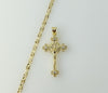 Gold plated small cross pendant on a delicate chain necklace.
Gold plated cross pendant suspended from a star chain neck