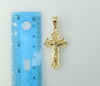 Cross pendant with diamond cut design and intricate details
Cross pendant featuring a delicate diamond cut pattern
Diamo