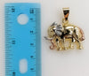 A delicate gold plated pendant featuring an elephant with a star symbol.