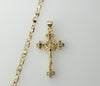 A gold-plated flat chain necklace with a small Jesus crucifix pendant and anchor charm.