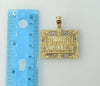 A gold plated pendant featuring The Last Supper design

A gold plated pendant in the shape of The Last Supper scene

Gol