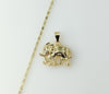 Gold plated chain necklace featuring a solid elephant pendant and star design.

Gold plated chain necklace with a detail