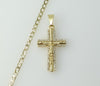 A 14K gold plated Cuban chain necklace with a small cross pendant.

A 14K gold plated chain necklace with a small cross