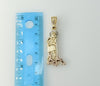 A gold-plated pendant featuring Saint Lazarus in intricate detail.
A close-up image of a gold-plated Saint Lazarus penda