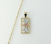 Tri-color gold plated elephant pendant on a 14K twisted chain necklace.