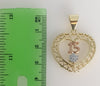 A delicate, heart-shaped pendant with a stylized star symbol.
A small, intricately detailed heart-shaped pendant with a