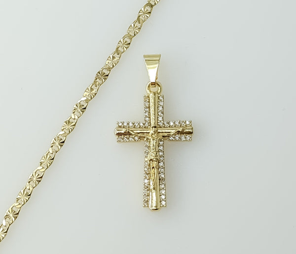 A delicate gold plated cross charm on a 3mm star chain necklace.