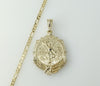A gold-plated Mexican Centenario 3mm Figaro chain double-sided necklace.